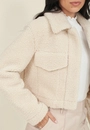 Casaco Cropped Em Pelinho Com Bolso Frontal