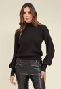 Blusa Tricô Gola Alta E Manga Bufante