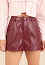 Shorts Saia Em Pu Com Bolsos