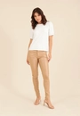 Calça Skinny Com Botão Em Tecido Resinado