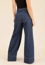 Calça Jeans Reta Com Barra Larga E Cinto