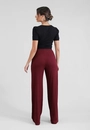 Calça Pantalona Com Bolso E Pregas Em Malha Canelada