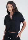 Camisa Em Malha Texturizada Manga Curta Com Elástico Barra