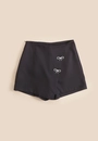 Short Saia  Alfaiataria Com Aplique Laço