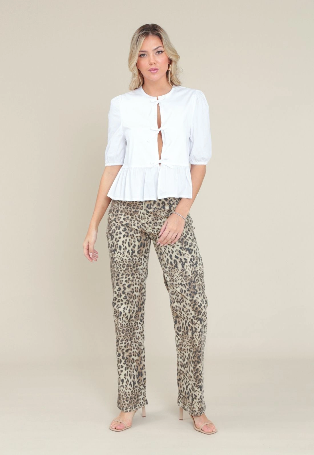 Blusa Em Tricoline Manga Curta Com Peplum E Laços