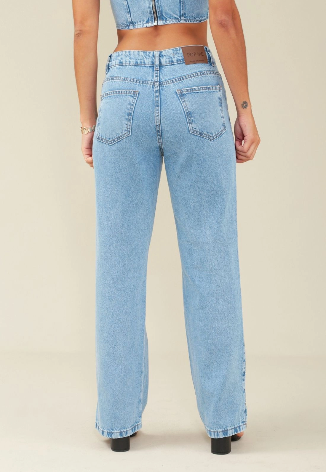 Calça Jeans Reta Abertura Na Barra