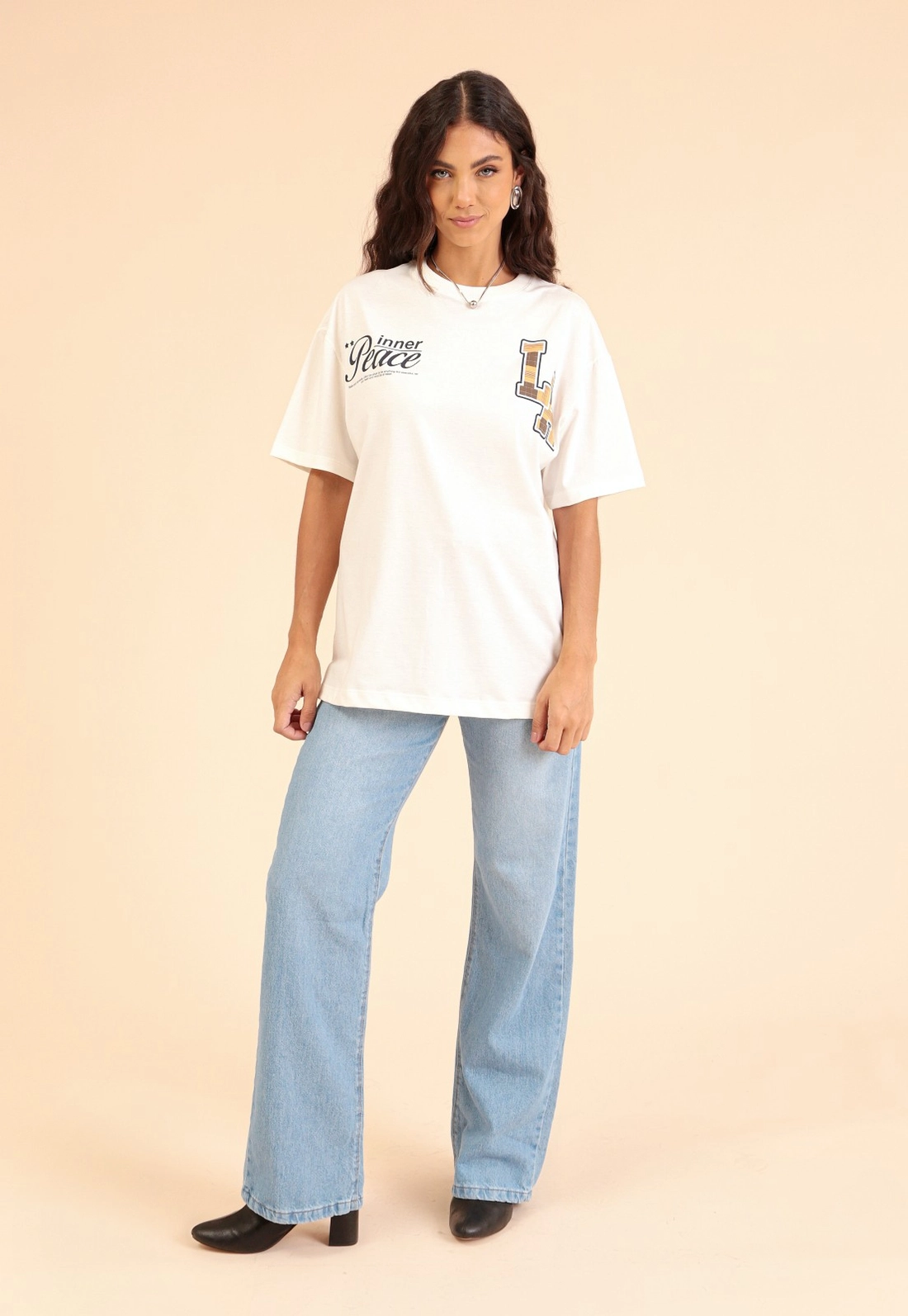 T-Shirt Oversize Manga Curta Em Meia Malha LA