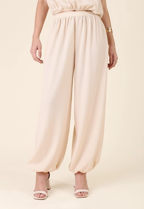 Calça Aladim Com Elástico Na Barra Em Malha Texturizada
